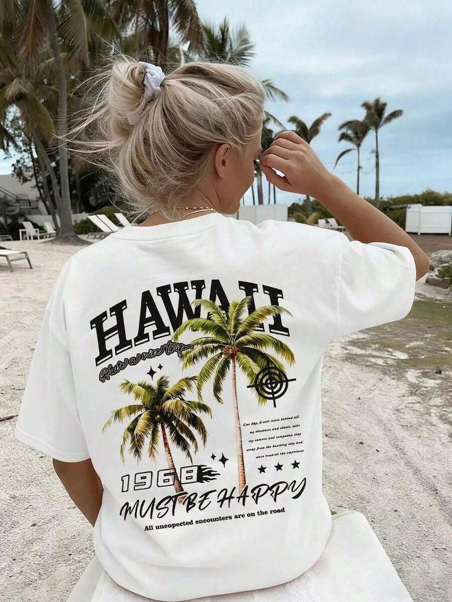 Camiseta estampada de moda para mujer, top holgado de estilo urbano, cómoda, elegante y versátil para el verano.Camiseta holgada para mujer, ideal para vacaciones tropicales, ligera y cómoda, con cuello redondo y mangas cortas, con estampado de palmeras. "Ropa popular de estilo isleño, adecuada para fiestas hawaianas, bodas en la playa, viajes en crucero y vacaciones casuales de verano." - Blanco - Ver 1