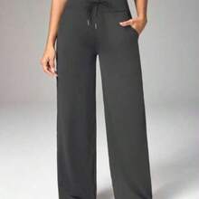 Dewbera Pantalones deportivos y de yoga para mujer con estampado de letras y cintura cruzada - Gris - Ver 1