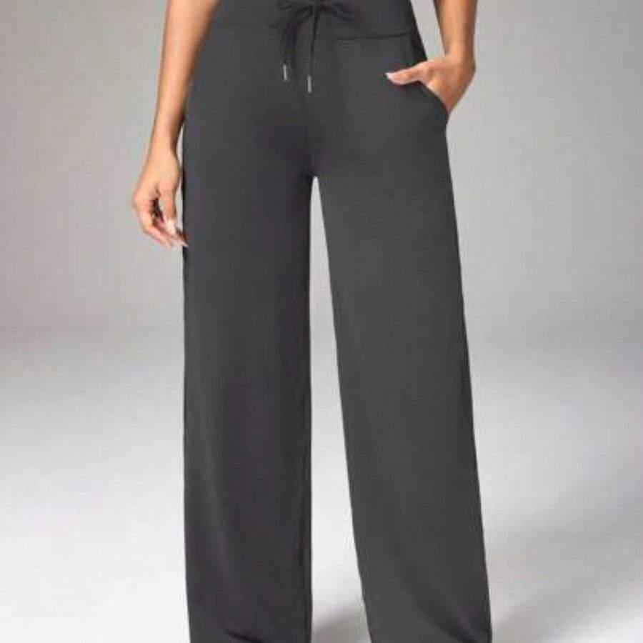 Dewbera Pantalones deportivos y de yoga para mujer con estampado de letras y cintura cruzada - Gris - Ver 1