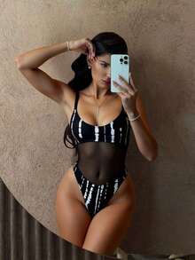 Traje de baño de una sola pieza para mujer con diseño de unicolor, tirantes, parches de malla, sexy y con recortes, estilo bohemio para festivales - Blanco y Negro - Ver 1