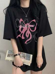 Camiseta de Mujer de Corte Holgado con Cuello Redondo y Manga Corta, Estampado de Letras y Lazos, Casual para Primavera/Verano, Negra Adecuado como regalo. playera de mujer. blusas>elegantes - Negro - Ver 1