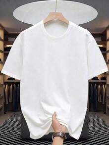 Una camiseta de hombre con cuello redondo, corte casual y estilo corto, elegante e informal, adecuada para salidas diarias, escuela y artículos esenciales de verano. UUUY - Blanco - Ver 2