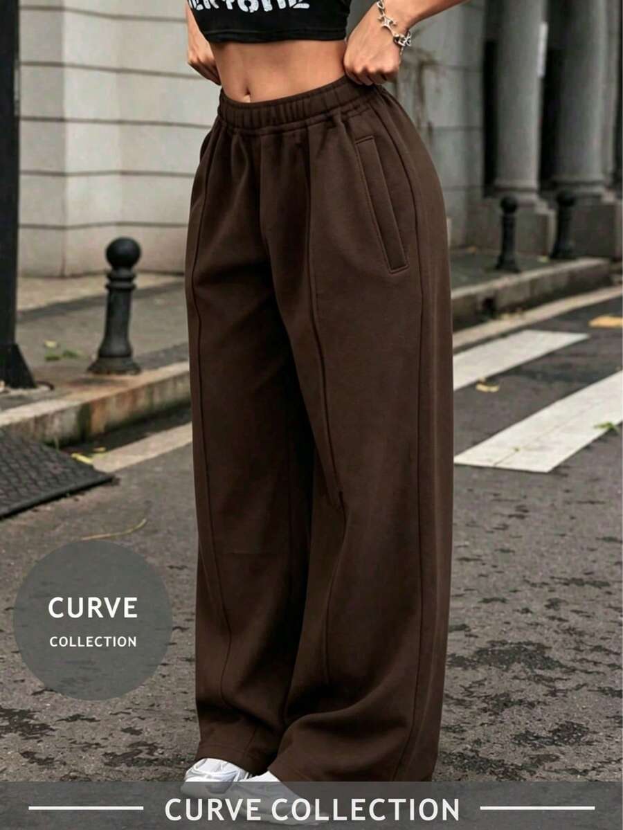 Pantalones anchos y sueltos de talla grande para mujer en color marrón, con cintura elástica y bolsillos. Cómodos y versátiles para la oficina, el fin de semana y las vacaciones - Marrón Chocolate - Ver 1