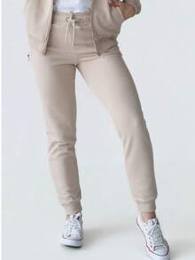Women's Jogger Sweatpants With Ribbed Leg Cuffs, A Ribbed Waistband With Drawstring, Made From French Terry Fabric - Beige - View 1
