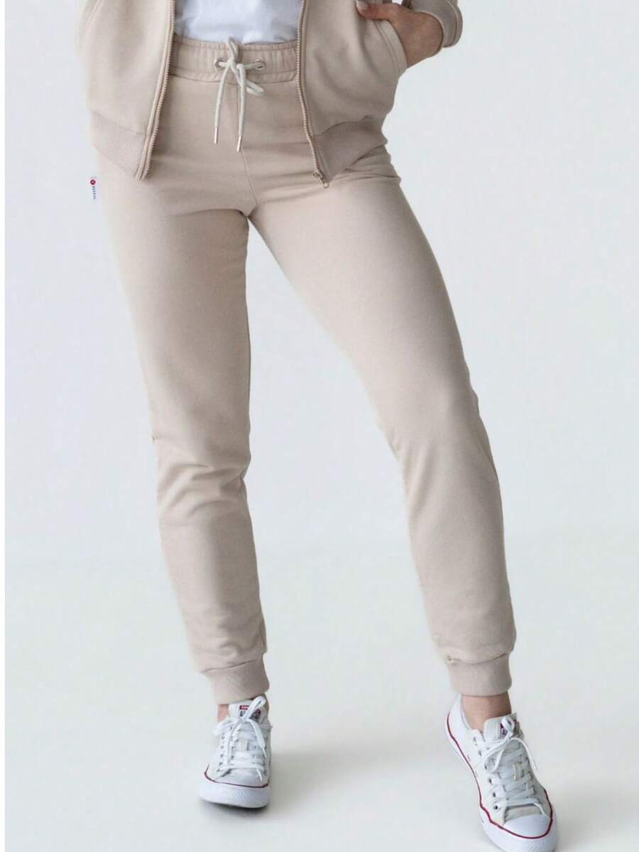 Women's Jogger Sweatpants With Ribbed Leg Cuffs, A Ribbed Waistband With Drawstring, Made From French Terry Fabric - Beige - View 1