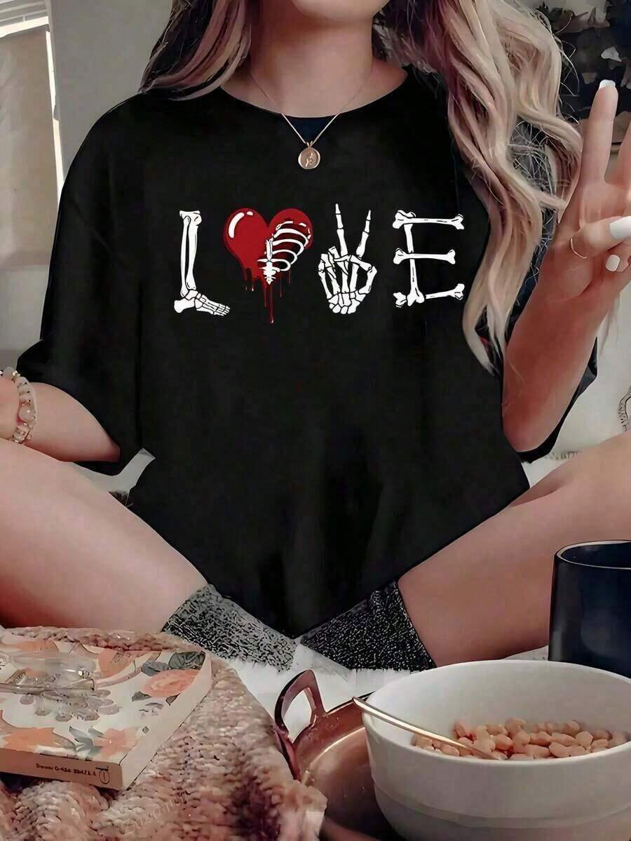 Camiseta de manga corta de algodón puro más vendida, versátil y favorecedora para la figura. Estilo de gran  recién lanzado en 2026. Top holgado de talla grande con diseño único de verano. Camiseta 100% algodón puro, gruesa, en blanco y negro, decorada con un diseño gráfico y estampado de letras a la moda, estilo unisex de manga corta. Nueva llegada para primavera, verano y otoño. Transpirable y cómodo, estilo streetwear sencillo y versátil, perfecto para conjuntos a juego para parejas. - Negro - Ver 1