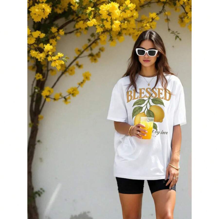 Camiseta de Algodón 100% de Longitud Media para Verano 2025 con Estampado de Limones Divertido, Juvenil y Moderno, Top Versátil - Negro - Ver 1