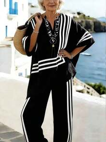 Holidaya 2026 Nuevo estilo casual de vacaciones de primavera/verano, conjunto de lino a rayas en beige y negro + blusa con estampado geométrico de manga murciélago + pantalones anchos con rayas laterales.Estilo relajado de vacaciones en la playa, conjunto a rayas en beige y negro, transpirable y suave para el verano, pantalones de cintura elástica, conjunto casual de 2 piezas para vacaciones, conjunto versátil de 2 piezas para ir al trabajo. - Negro - Ver 1