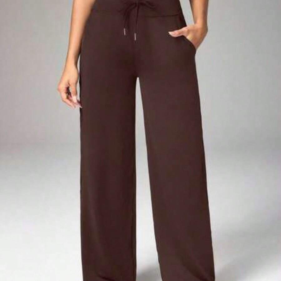Dewbera Pantalones deportivos y de yoga para mujer con estampado de letras y cintura cruzada - Marrón - Ver 1