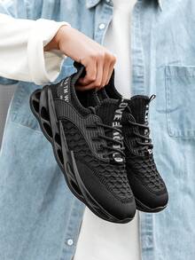 Zapatillas de running de moda clásica para hombres, de unicolor con estampado aleatorio de letras, parche delantero con cordones, versátiles para uso diario y exterior, cómodas de malla de punto y tejido casual deportivo - Negro - Ver 9
