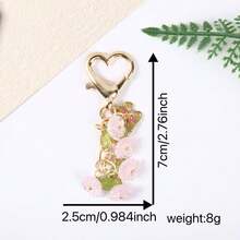 1 Móc khóa hình hoa và bướm màu hồng dễ thương, móc cài hình trái tim, phụ kiện túi xách. - Nhiều màu - Xem 6