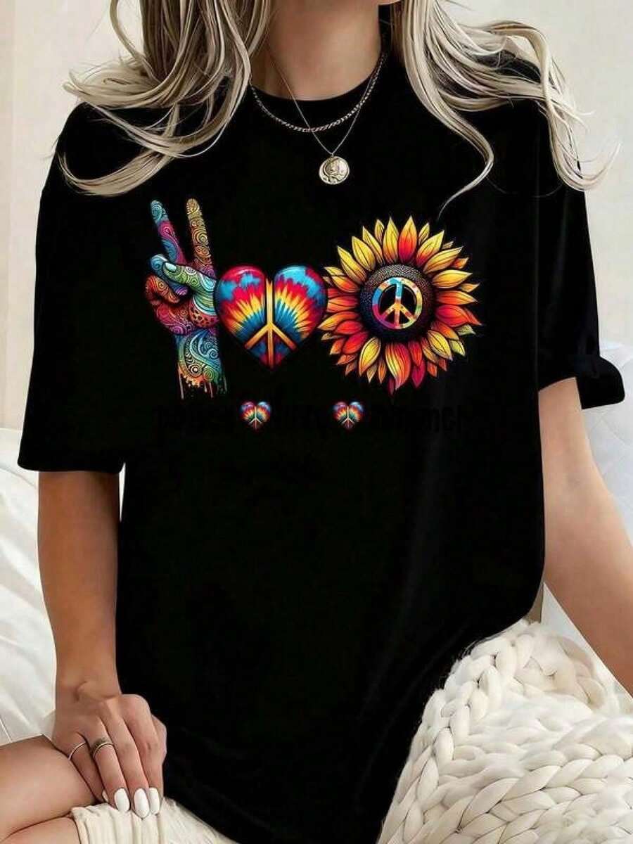Camiseta de manga corta con cuello redondo y estampado gráfico holgado para mujeres de talla grande, con un diseño colorido de una mano de paz, corazón y girasol. Prenda versátil, adecuada para todas las estaciones, camiseta unisex de manga corta, perfecta para salir y como regalo de Navidad. - Negro - Ver 1