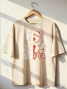Camiseta de Manga Corta con Oso Divertido y Caligrafía Juvenil,Camiseta de manga corta de moda para primavera y verano de 2026, hecha en México, 180 gramos. Estampado de dibujos animados, modelo de pareja, apta para uso interior o exterior. Cuello redondo, unisex, ideal para oficina y ocio. Paquete de una pieza. - APR-P631577SLNDXZGY396 - Ver 1