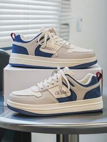 Zapatos de skate con bloqueo de color retro, parche de PU y patrón de letras con cordones para hombres. Zapatillas deportivas casuales cómodas y minimalistas para caminar al aire libre, tallas grandes para parejas - Milán - Ver 1