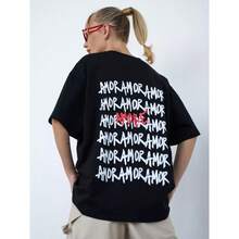 Camiseta de manga corta 100% algodón, estilo nuevo de verano 2025, casual y divertida con estampado de letras a la moda, top fresco y elegante. - Negro - Ver 1