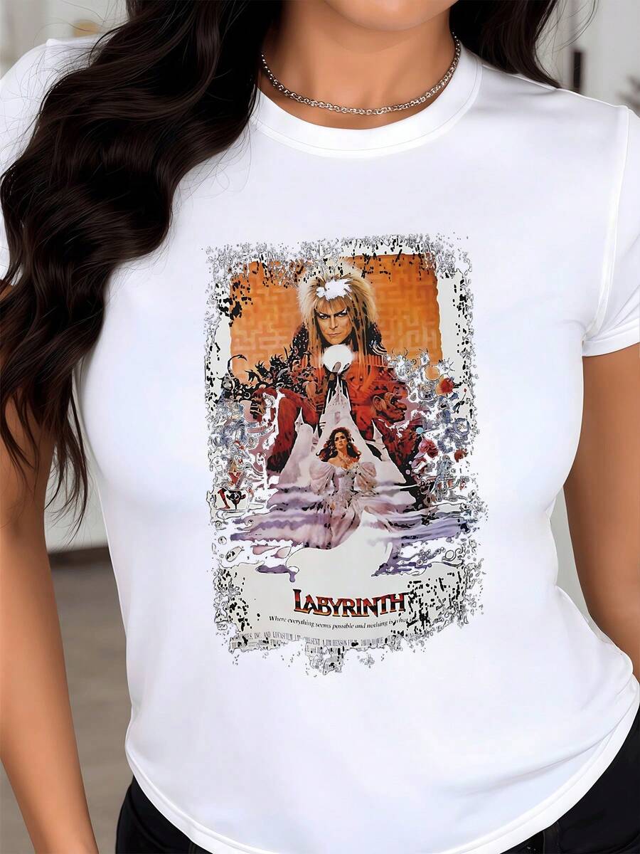 A Fantastical Scene Where A Brave Young Woman Journeys Among Mysterious Creatures And Imposing Figures In A World Of Illusion And Challenges That Symbolize The Inner Quest And The Power Of Imagination. A Modern, Comfortable Women's T-Shirt For Everyday Wear And Casual Occasions. - 白色 - 查看 1