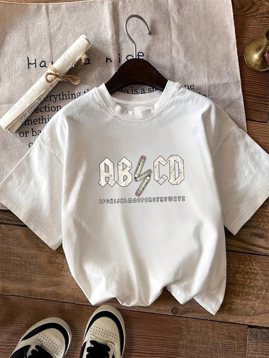Camiseta de manga corta y cuello redondo para mujer, múltiples colores disponibles, camiseta estándar para mujer, patrón de estampado abstracto de letras y lápiz a juego, camiseta base moderna, para salidas diarias, adecuada para todas las estaciones, ropa casual - Blanco - Ver 1