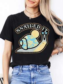 Camiseta casual de mujer con estampado de caracol SNAILED IT |     Comodidad diaria divertida con cuello redondo, tejido ligeramente elástico, mangas cortas, para todas las estaciones - Negro - Ver 1