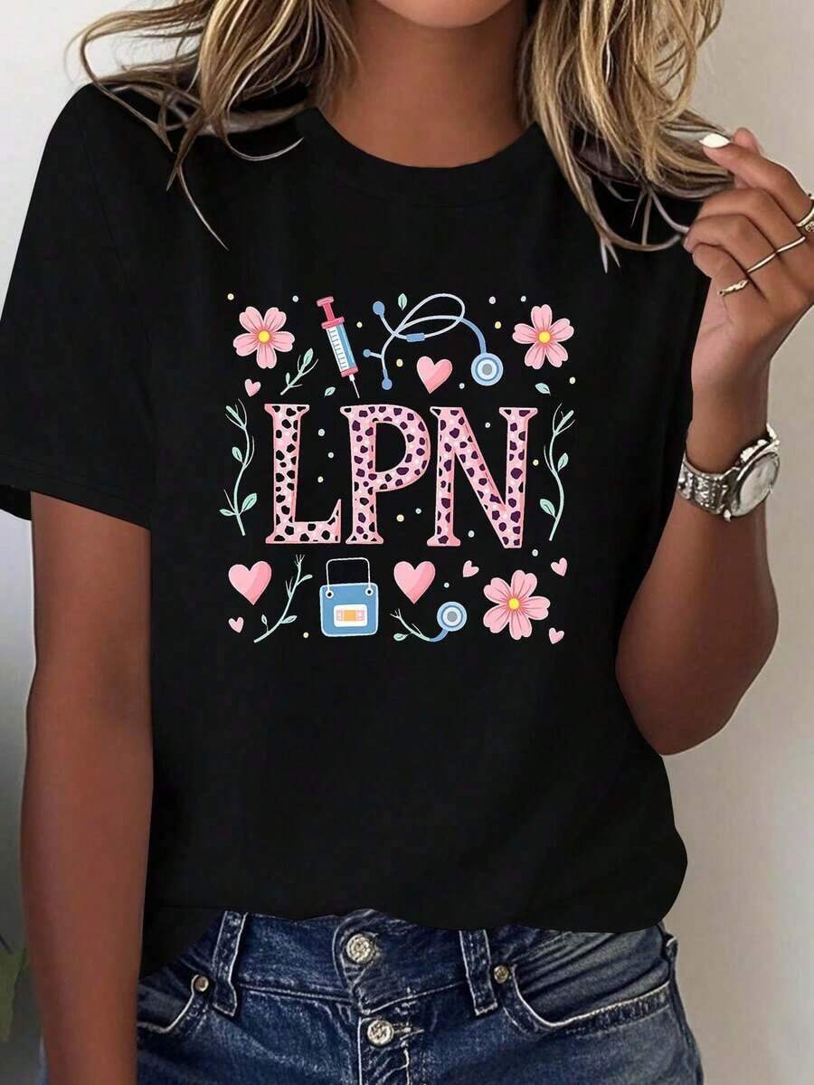 1 pieza de camiseta profesional cálida "LPN" para mujer, de moda casual, con cuello redondo, para primavera/verano, con estampado de jeringa, estetoscopio y flores, 180g, 100% algodón. - Negro - Ver 1