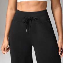 Dewbera Pantalones deportivos y de yoga para mujer con estampado de letras y cintura cruzada - Gris - Ver 5