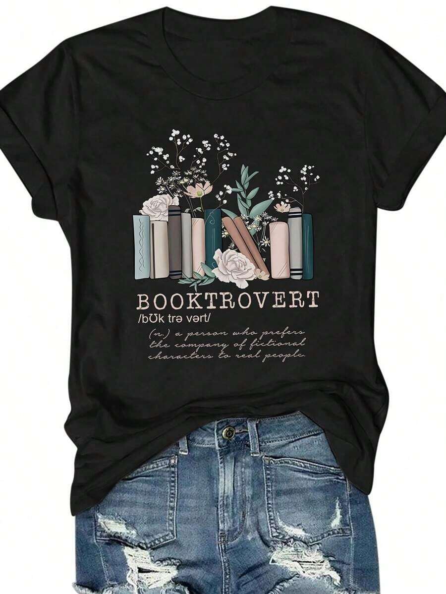 Camiseta de mujer de manga corta y cuello redondo con estampado de flores y libros, Camiseta gráfica de mujer "BOOKTROVERT Una persona que prefiere la compañía de personajes ficticios a la de las personas reales" - Negro - Ver 1
