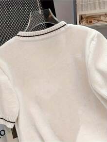 Nueva blusa de estilo casual de punto con cuello redondo y mangas cortas, con bloques de color, holgada y acortada, ideal para la primavera en color negro - Blanco - Ver 3