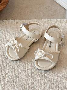 1 đôi sandal ren nơ màu trắng kem cho bé gái, thiết kế hở mũi, một quai với khóa điều chỉnh, đế bằng mềm mại, chống trơn trượt, thích hợp cho mùa xuân/hè đi biển, phong cách thường ngày, công chúa. - trắng - Xem 1