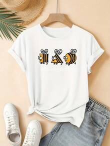Una camiseta de moda y alegre con estampado de abeja de dibujos animados para mujer, con cuello redondo y mangas cortas. Es lavable a máquina y perfecta para un estilo casual de calle, lo que la convierte en un regalo ideal para usar en casa o en la oficina. - Blanco - Ver 1