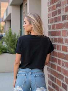 Una camiseta de mujer con estampado de letras y diseño de LOS ANGELES - Negro - Ver 3