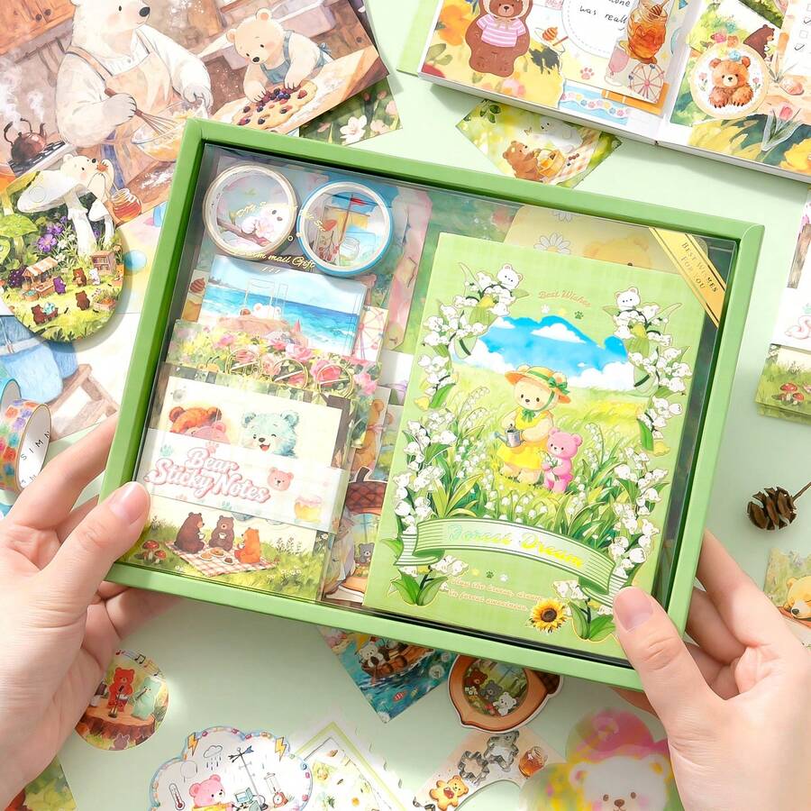 Bộ văn phòng phẩm chủ đề gấu dễ thương, bao gồm sổ tay, sticker, vật liệu làm album ảnh và hộp quà.