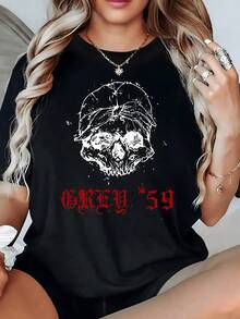 Cráneo con casco agrietado que representa fortaleza ante la adversidad con detalles rojos que evocan energía y actitud rebelde camiseta de mujer casual moderna cómoda para uso diario - Negro - Ver 8