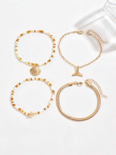 4件套波西米亚风金色海星手工串珠脚链，简约金属厚蛇壳鱼尾吊坠饰品，适合青少年和年轻人日常佩戴、旅行和度假。