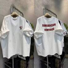 Camiseta moderna con estampado de letras, holgada y versátil, de manga corta, casual y elegante, de alta gama europea y americana, 100% algodón puro. - Negro - Ver 4