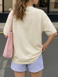 de camiseta de manga corta holgada con estampado floral y pantalones cortos a rayas para mujer, adecuado para vacaciones en la playa, traje de mujer, conjunto de verano para mujer, atuendo de vacaciones, ropa de viaje, estilo de playa, ropa de va - Albaricoque - Ver 2