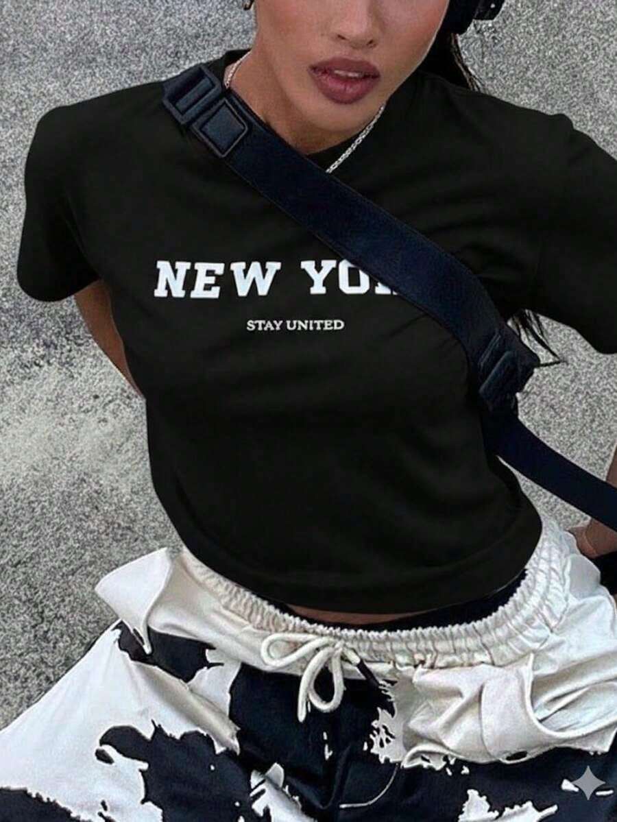Camiseta de manga corta para mujer, estilo vintage lavado, transpirable, con estampado gráfico de letras urbanas retro, cuello redondo, corte ajustado, top casual, ropa ligera y transpirable para uso diario, festivales de música, conciertos, vacaciones, escapadas de fin de semana, perfecta para estilo urbano, salidas casuales, campus universitario, gimnasio y looks de verano Y2K, ropa de calor mujer. - Negro - Ver 1