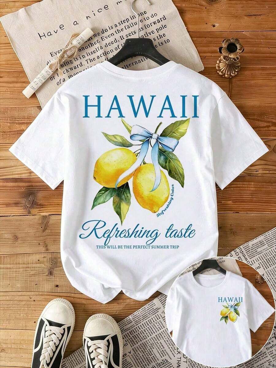 Avslappnad dam-T-shirt med citrontryck, korta ärmar och rund hals. - Vitt - Visa 1