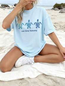 Women's Blue Short-Sleeved T-Shirt With A Round Neck And Turtle Print, A Casual Spring And Summer Style With A Modern Design Suitable For Everyday Wear On Vacation. Graphic T-Shirts For Women, Pink And Black - 淺藍色 - 查看 6