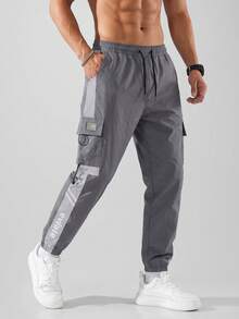 CZRLHYT Pantaloni kaki largi pentru bărbați, cu buzunare cu clapă, pantaloni jogger kaki pentru bărbați, de vară, cu talie cu șnur, cu design lateral unic, potriviți pentru diverse activități în aer liber, talie cu șnur, buzunare laterale, toamnă - Gri - Vizualizare 1