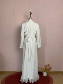 Vestido largo de encaje primavera 2026, cuello en V, botonadura simple, manga larga, estilo elegante europeo-americano - Blanco - Ver 7