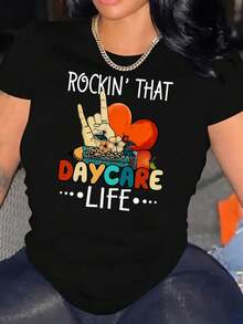 100% Algodón Talla Grande - Talla Grande - Camiseta Gráfica para Mujer, Celebrando la Vida en la Guardería - Camiseta negra de manga corta con un divertido diseño de cabeza que se mueve y un patrón de corazones, hecha de tela ligera, perfecta para uso casual, con un diseño divertido. |   Top estampado interesante |   Tela elástica para uso diario informal - Negro - Ver 2