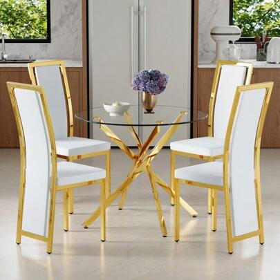 Table And Chair Set. 88 Cm Luxury Dining Table Made Of Tempered Glass With A Gold-Colored Cross-Shaped Metal Frame, Combined With 4 Minimalist White PU Dining Chairs With Gold Trim.