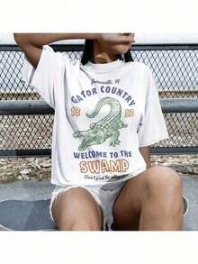 1 camiseta de fútbol universitario Gators Game Day, vintage de Florida, linda para chica o niño, regalo de Navidad para estudiante, camiseta de algodón grueso Gainseville Swamp Taiate. Ofrece un ajuste estructurado, una sensación suave y durabilidad a largo plazo. Perfecta para un estilo casual, para usar en capas o como prenda esencial de uso diario, es transpirable pero resistente: tu nueva camisa favorita. 180g 100% algodón, los diseños están impresos. Unisexo. - Blanco - Ver 8