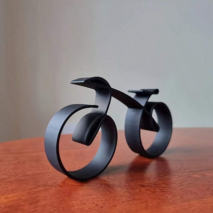 一款3D打印自行车摆件。简约风格的3D打印自行车摆件,适用于家居桌面、玄关装饰,也是送给自行车爱好者的礼物,纯手工制作。桌面摆件,迷你摆件。适合圣诞节、复活节、万圣节等节日。 - 均碼 - 查看 1