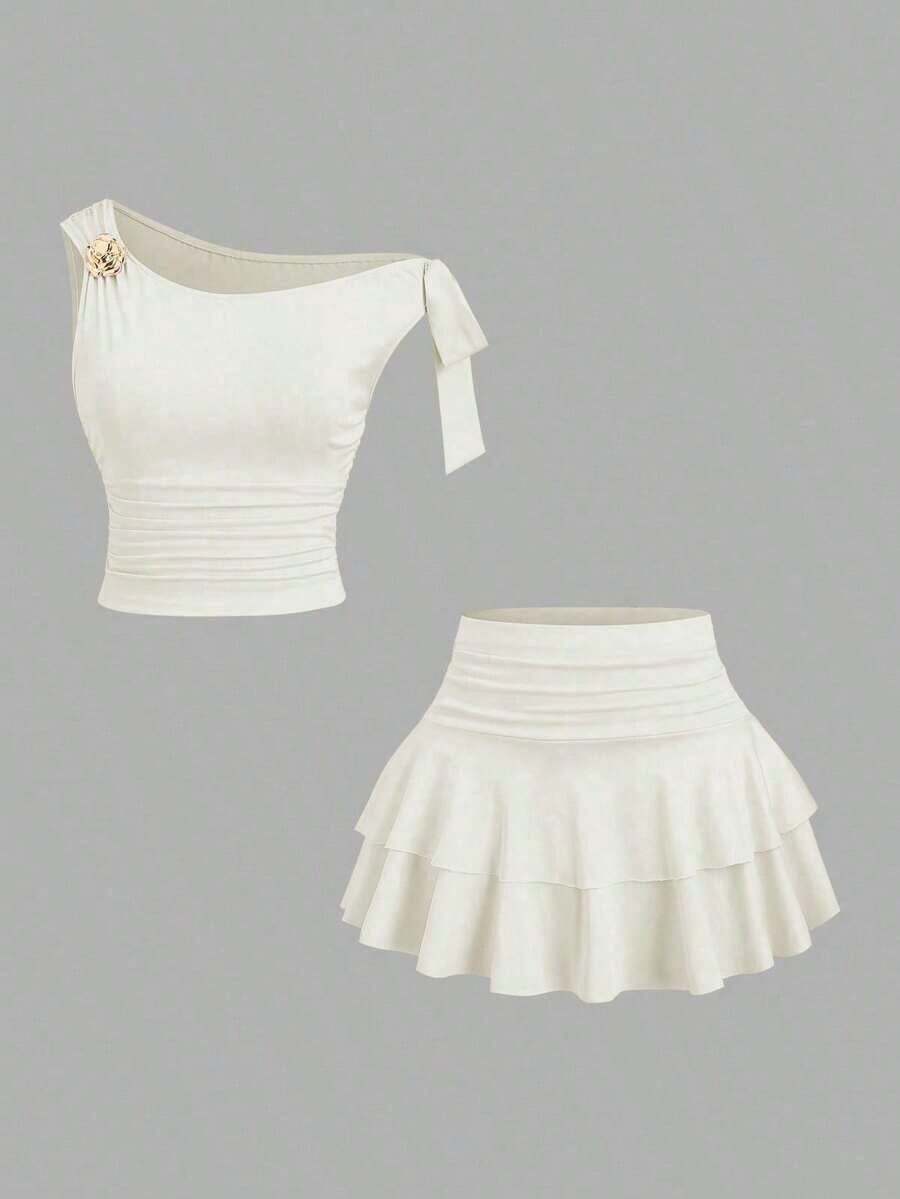 Conjunto de top de tirantes y minifalda plisada y con decoración de flores metálicas para mujer, ideal para el verano - Albaricoque - Ver 1