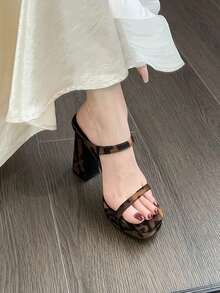 Giày sandal cao gót màu nâu họa tiết da báo gợi cảm mới nhất mùa hè 2026 dành cho nữ, đế dày siêu cao, quai đơn giúp tăng chiều cao, gót chunky tối giản, thanh lịch và đa năng. - màu nâu - Xem 8
