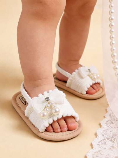 Giày sandal mùa hè cho bé gái, có nơ hoa, đế mềm, thích hợp cho váy cưới, giày tập đi cho bé sơ sinh, giày tập đi trong nôi.