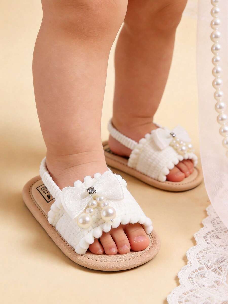 Giày sandal mùa hè cho bé gái, có nơ hoa, đế mềm, thích hợp cho váy cưới, giày tập đi cho bé sơ sinh, giày tập đi trong nôi.