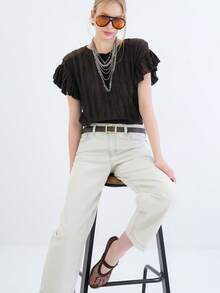 A Textured Short-Sleeve Top Featuring A Classic Round Neckline And Softly Ruffled Sleeves. Designed With A Lightweight Feel And An Easy Silhouette, This Versatile Piece Adds A Subtle Statement To Everyday Styling. - Brown - View 5