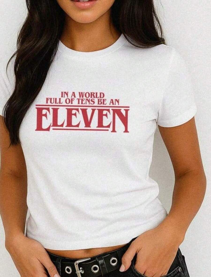 Camiseta de cuello redondoStranger Eleven Cropped Baby Tee,Camiseta con estampado kawaii,Top de estilo urbano hip-hop,blusas para mujer,La elección perfecta para tus atuendos de San Valentín,afiliado ,camiseta masculina con gráfico divertido,Prenda masculina de moda - Blanco - Ver 1