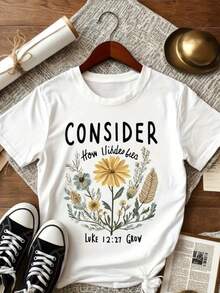 Camiseta de manga corta de mujer - una camiseta blanca con un diseño inspirado en el crecimiento de lirios de Lucas 12:27. Hecho de tela elástica, suave, es adecuado para el desgaste casual, lavable en máquina - Blanco - Ver 2
